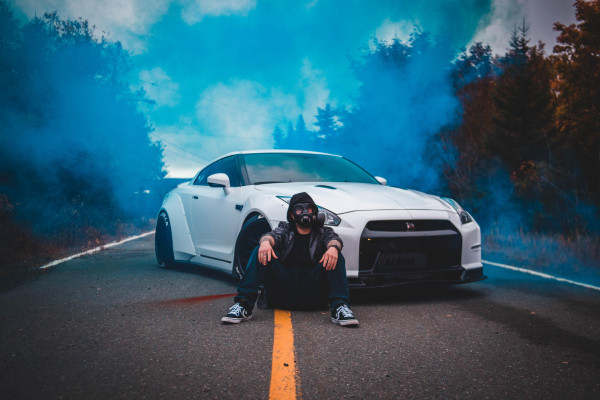 man-gas-mask-car-smoke-cloud.jpg